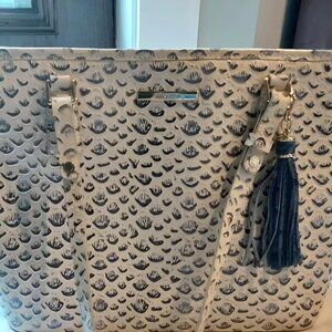 Brahmin medium tote, with blue print, and has a tassel decoration. Pre-loved